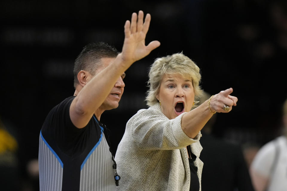 Iowa head coach Lisa Bluder questions a call during the first half of an NCAA college basketball game against Penn State, Thursday, Feb. 8, 2024, in Iowa City, Iowa. (AP Photo/Charlie Neibergall)