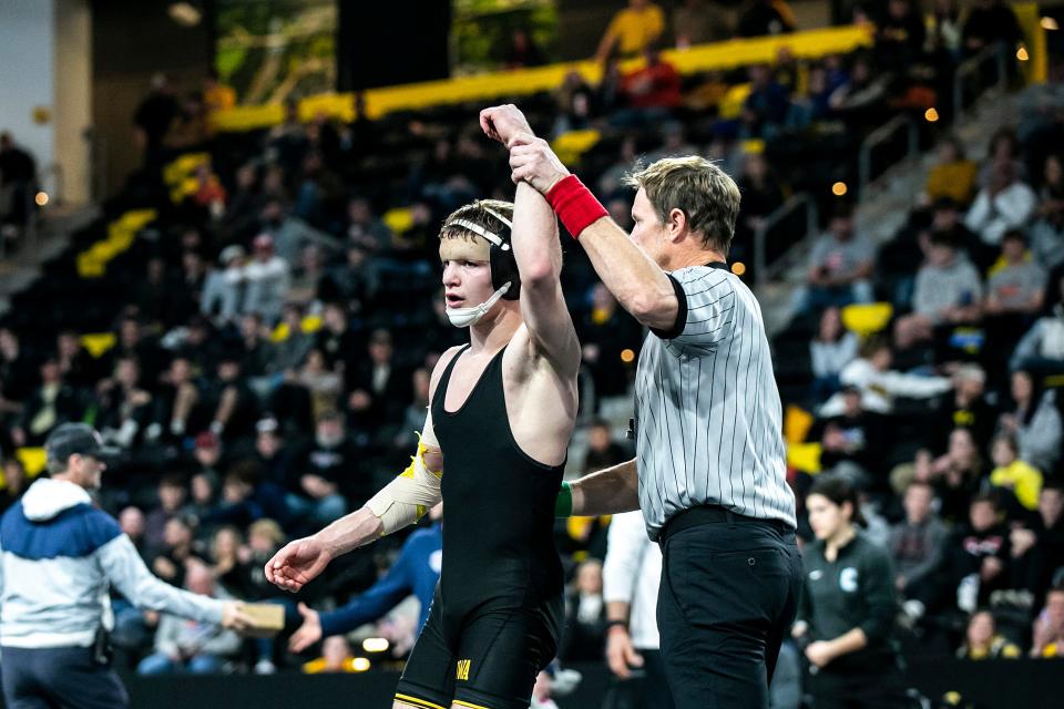 Iowa's Cullan Schriever has his hand raised after scoring a decision at 133 pounds in the finals during the Soldier Salute college wrestling tournament.