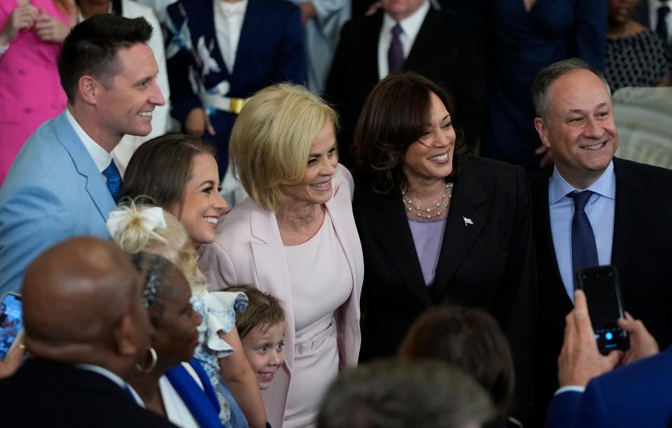 LSU women's basketball coach Kim Mulkey poses with Vice President Kamala Harris and Second Gentleman of the United States Douglas Emhoff, as President Joe Biden, left, and First Lady Jill Biden welcome Louisiana State University Tigers to White House on May 26, 2023. The President and First Lady welcomed the LSU Tigers women’s basketball team to the White House to celebrate their 2022-2023 NCAA Championship seasons at The White House.