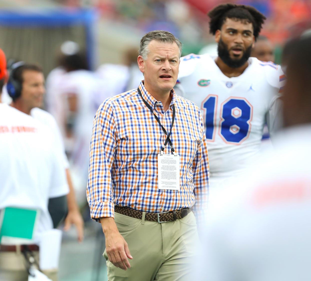 University of Florida athletic director Scott Stricklin stands on the sideline during the second game of the season against the USF Bulls at Raymond James Stadium,in Tampa on Sept. 11.