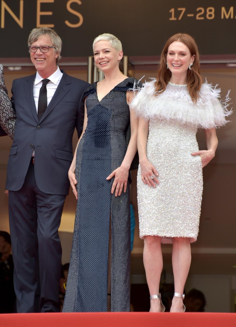 <p>The two actresses showed off their fashion skills with Michelle arriving in a spotted Louis Vuitton gown and Julianne wearing a feathery beaded look by Chanel.<br><i>[Photo: Getty]</i> </p>