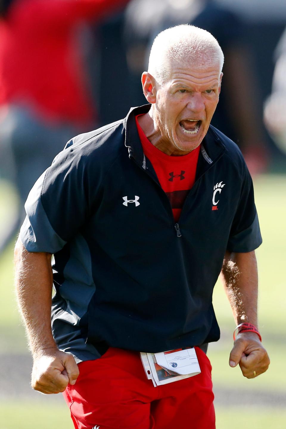 Cornerbacks coach and special teams coordinator Kerry Coombs shouts during the first day of preseason training camp at the University of Cincinnati’s Sheakley Athletic Complex in Cincinnati on Wednesday, Aug. 3, 2022.