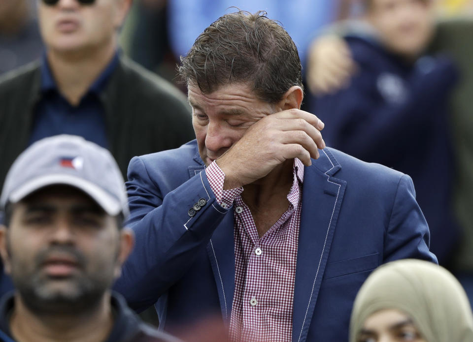 A man wipes a tear from his face during a national remembrance service in Hagley Park for the victims of the March 15 mosque terrorist attack in Christchurch, New Zealand, Friday, March 29, 2019. (AP Photo/Mark Baker)
