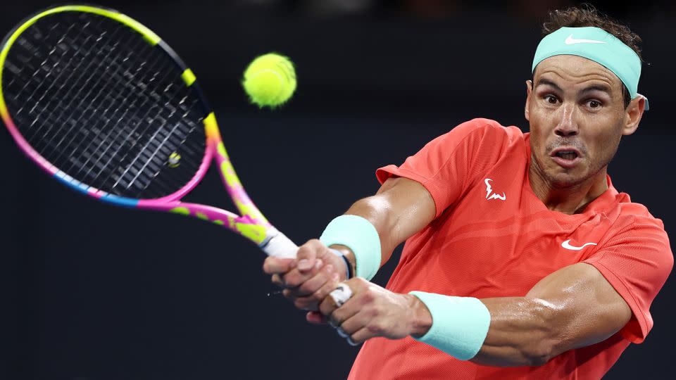 Nadal plays a backhand against Thompson. - Chris Hyde/Getty Images