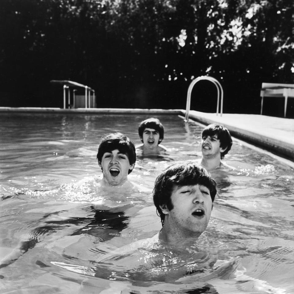 <div class="inline-image__caption"><p>Paul McCartney, George Harrison, John Lennon & Ringo Starr of the Beatles, taking a dip in a swimming pool, 1964.</p></div> <div class="inline-image__credit">John Loengard/Life Magazine/The LIFE Picture Collection via Getty</div>