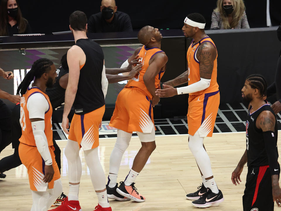 Patrick Beverley pushes Chris Paul during Game 6 of the Western Conference finals at Staples Center on June 30, 2021. (Ronald Martinez/Getty Images)