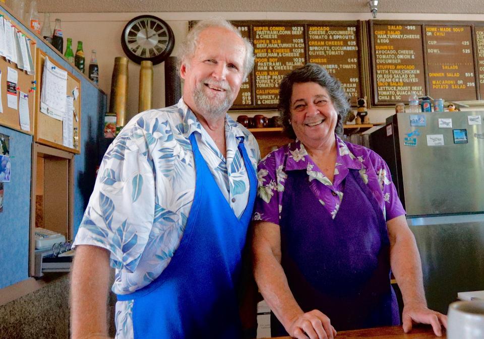 Pat and Sandy Watson, owners of the Sandwichery in downtown Redding, pose inside their sandwich shop on Thursday, Sept. 22, 2022. Parking is scarce outside their shop as it is in most of downtown Redding.