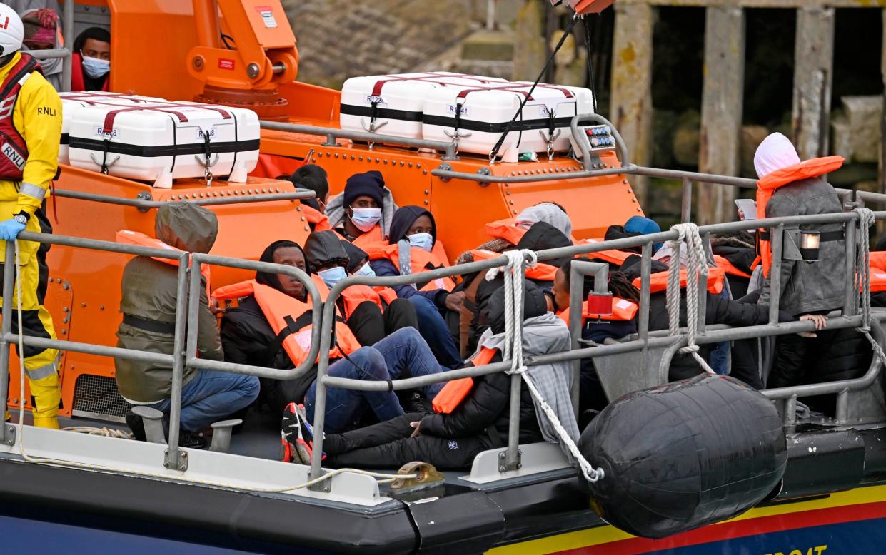 The RNLI's Dover lifeboat rescued a group of migrants off the Kent coast after they had crossed the English Channel in blustery conditions on Tuesday - Steve Finn