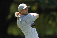 Adam Scott, of Australia, hits off the sixth tee during the third round of the St. Jude Championship golf tournament, Saturday, Aug. 13, 2022, in Memphis, Tenn. (AP Photo/Mark Humphrey