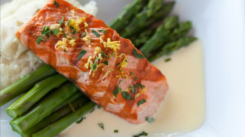Grilled salmon on asparagus
