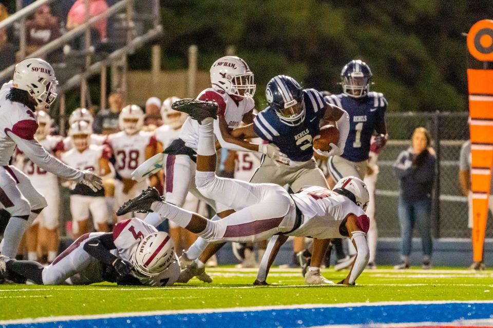 Effingham County's Keion Wallace fights his way toward the end zone through the defense in a game earlier this season.