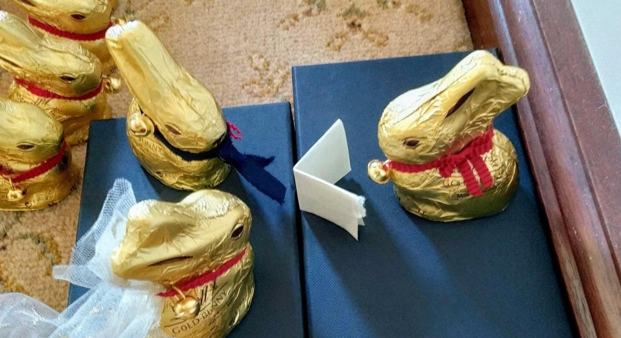 A couple have put on a wedding ceremony using 115 chocolate bunnies after their big day was called off due to coronavirus (SWNS)