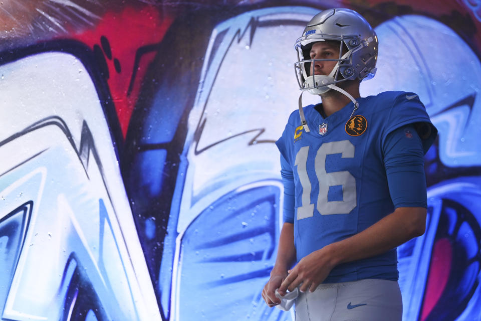 Detroit Lions quarterback Jared Goff walks through the player tunnel befoer the first half of an NFL football game against the Green Bay Packers, Thursday, Nov. 23, 2023, in Detroit. (AP Photo/David Dermer)