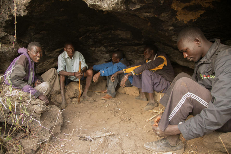 Friends gather in a cave in Kenya's Great Rift Valley. People who live here are at greater risk of contracting cutaneous leishmaniasis because the sand flies that spread the disease tend to swarm&nbsp;in cool, rocky areas. (Photo: Zoe Flood)