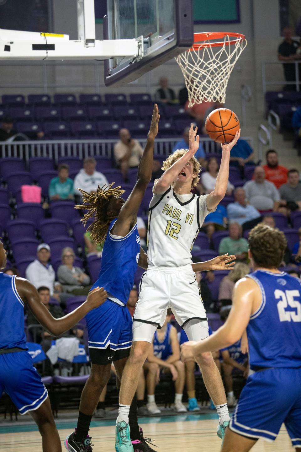 Garrett Sundra of Paul VI goes up for a shot against Canterbury in the City of Palms Classic on Saturday, Dec. 17, 2022, at Suncoast Credit Union Arena in Fort Myers.