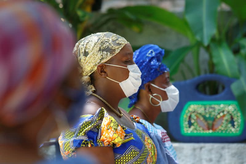 Voodoo priestess, known as Mambo, wear face masks to protect from the spread of the coronavirus disease (COVID-19) as they take part in a ceremony in Port-au-Prince