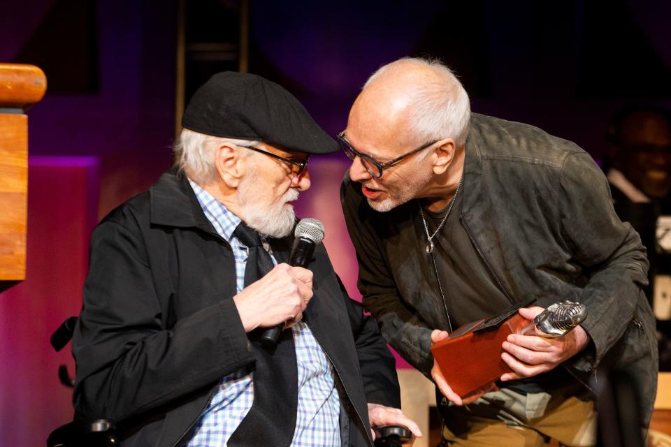 Don Nix speaks with Peter Frampton as Frampton shows Nix his “The Mic” trophy after Nix was inducted into the Memphis Music Hall of Fame during the 2023 Induction Ceremony at the Cannon Center for the Performing Arts in Memphis, Tenn., on Thursday, October 12, 2023.