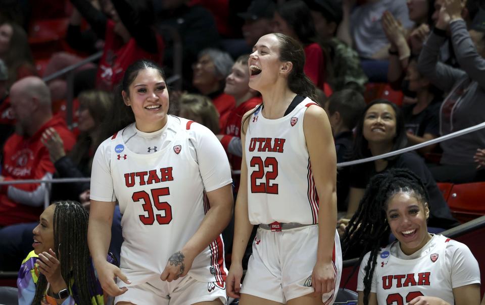 Utah Utes forwards Alissa Pili (35), Jenna Johnson (22) and Teya Sidberry (32) cheer during the game against Gardner-Webb during the NCAA First Round at the Jon M. Huntsman Center in Salt Lake City on Friday, March 17, 2023.