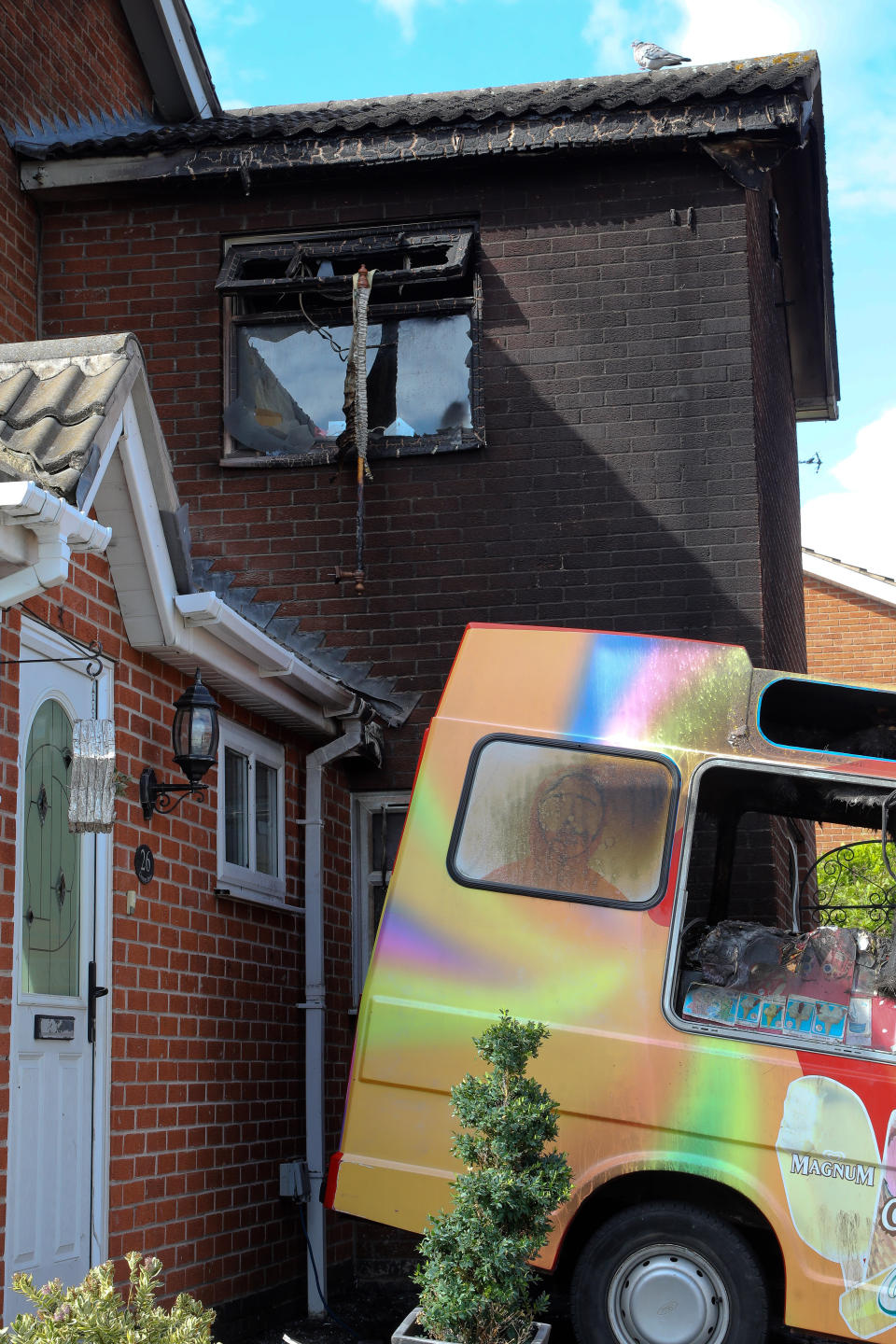 The charred remains of the house and ice cream van of Tony Delbusso (SWNS)