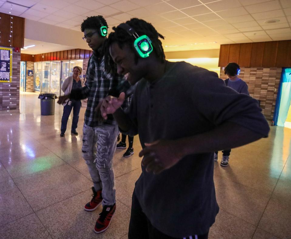 Alex Weaver and JB Thomas dance during J. Graham Brown School's first silent disco.