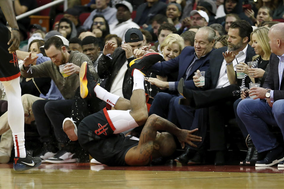 P.J. Tucker dove into Alex Bregman at the Rockets game. (Getty Images)