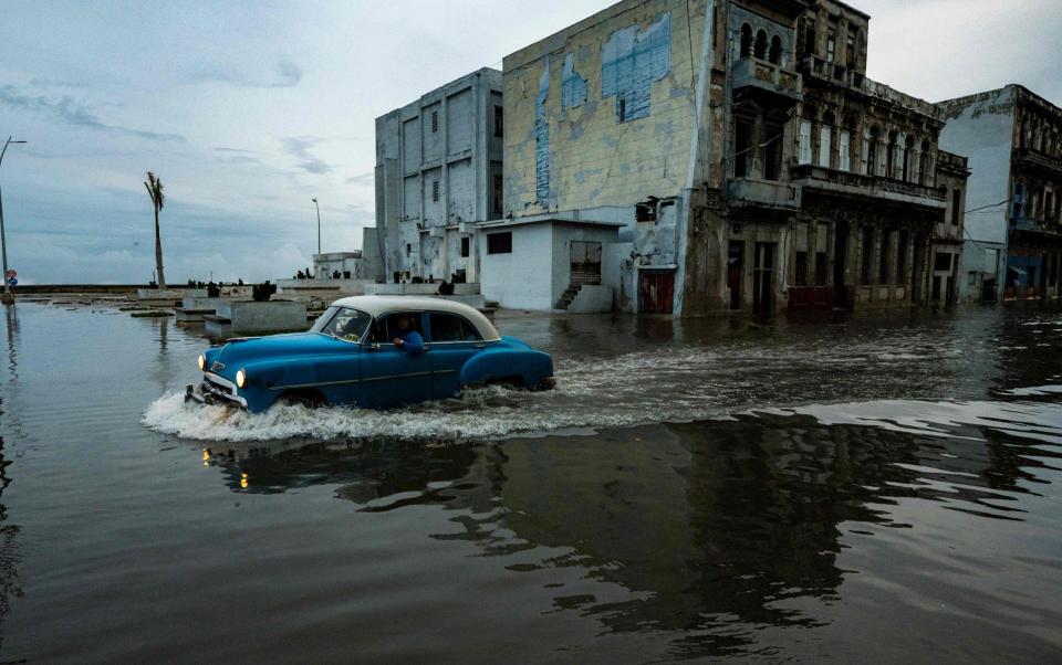 Hurricane Ian has already caused widespread devastation in Cuba where it knocked out the entire country's electricity - YAMIL LAGE/AFP