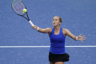 Shelby Rogers, of the United States, returns a shot to Petra Kvitova, of the Czech Republic, during the fourth round of the US Open tennis championships, Sunday, Sept. 6, 2020, in New York. (AP Photo/Frank Franklin II)