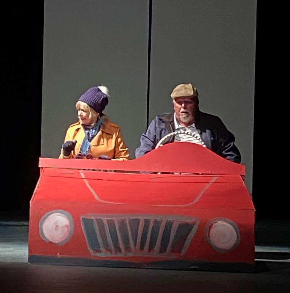 Liz Argo and Mike Barry as an older couple trying to negotiate with their self-starting car.