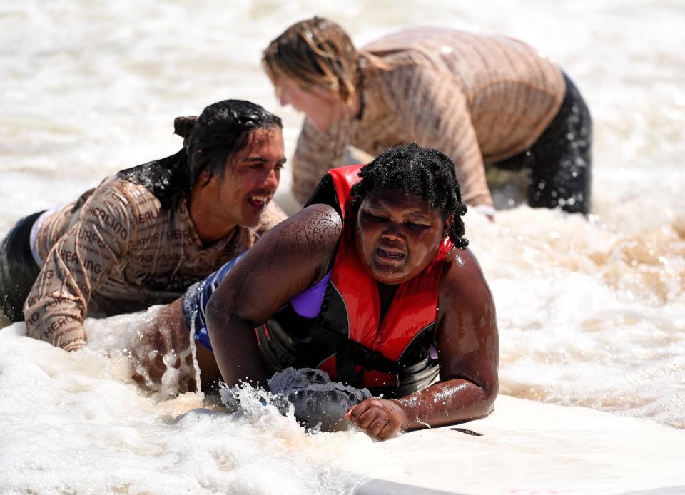 Surfers Healing held a one-day surf camp for autistic children Wednesday, Aug. 17, 2022, in Ocean City, Maryland.