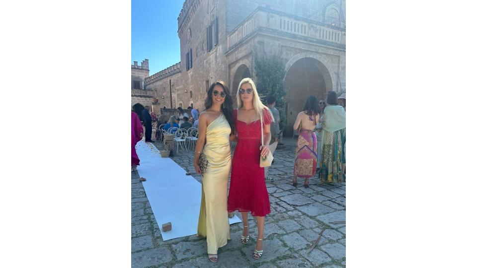 Amelia Spencer in red Self-Portrait dress with wedding guest 