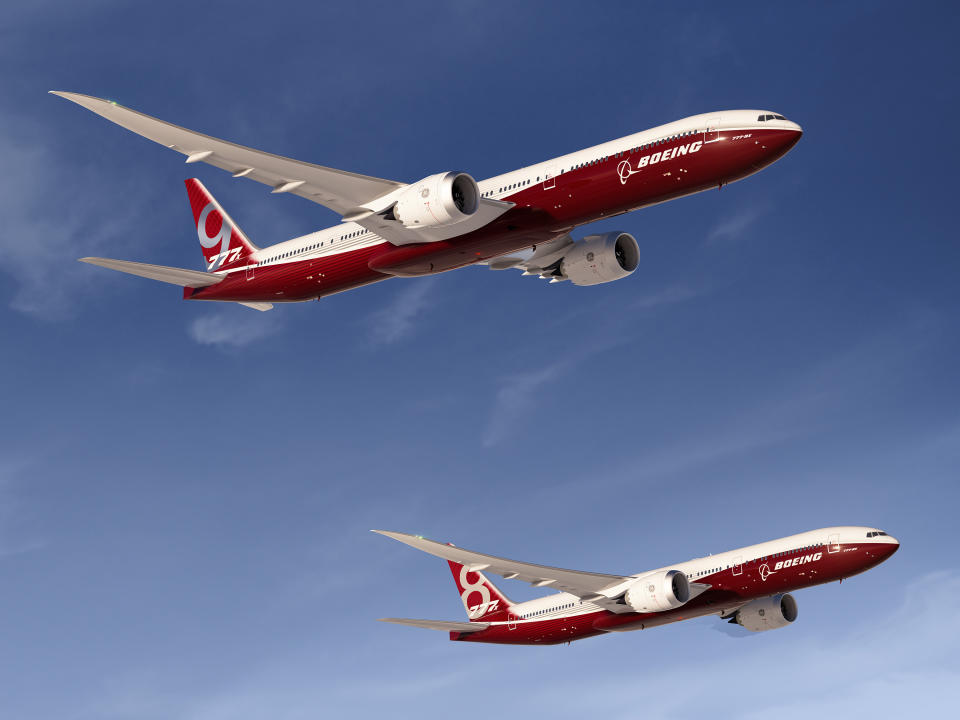 In this artist's concept provided by The Boeing Co. is the aerospace company's new family of 777X jetliners, the 777-9X, top, and 777-8X. Boeing currently has more than a dozen states in competition from coast to coast offering property, billions of dollars of tax breaks, favorable labor deals and customized employee training hoping that Boeing will choose them to assemble its new 777X jetliner. (AP Photo/The Boeing Co.)