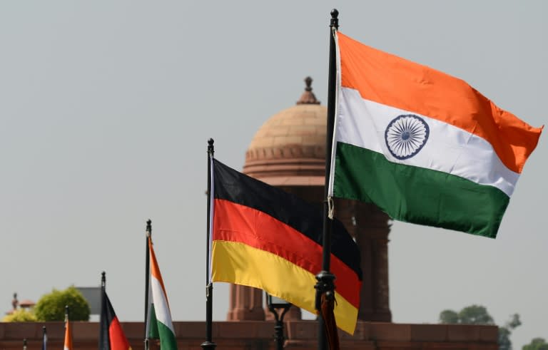 Indian and German flags fly on Rajpath in New Delhi, on October 4, 2015