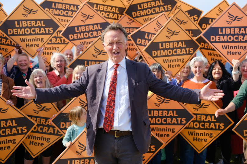 St Ives constituency candidate Andrew George and Liberal Democrats supporters at Sennen Cove on Tuesday, July 2.