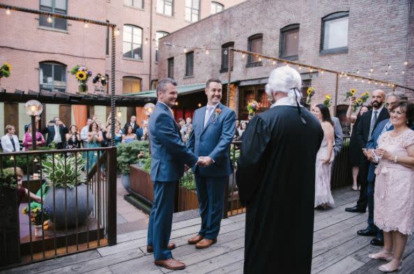 "Mark and Steven surprised their guests with an unannounced ceremony where the officiant was dressed up like a judge! The ceremony was a beautiful mix of fun and touching moments." --&nbsp;<i>Williamsburg Photo Studios&nbsp;</i>