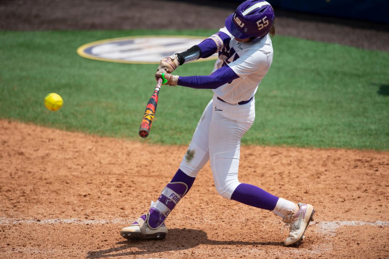LSU Tigers player Raeleen Gutierrez (55) hits the ball during the SEC softball tournament at Jane B. Moore Field in Auburn, Ala., on Wednesday, May 8, 2024. LSU Tigers defeated Alabama Crimson Tide 3-2 in 14 innings.