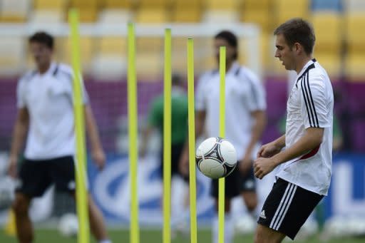Germany open their Euro 2012 campaign bidding to beat Portugal for the third successive time at a major finals with captain Philipp Lahm, seen here at a training session on June 8, insisting his team must show what they can do on Saturday
