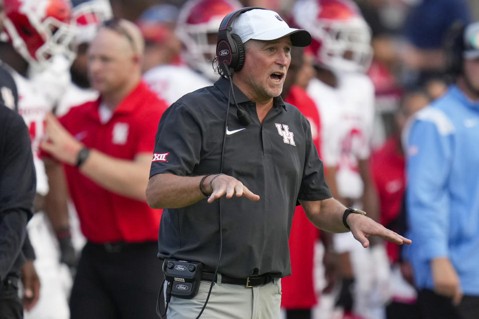 Houston head coach Dana Holgorsen watches from the sideline during the first half of an NCAA college football game against Rice, Saturday, Sept. 9, 2023, in Houston. (AP Photo/Eric Christian Smith)