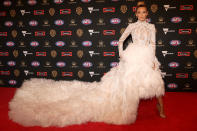 <p>Logan definitely ruffled some serious feathers on the red carpet. She accompanied Jason Johannisen of the Bulldogs on the night. <br>Photo: Getty </p>