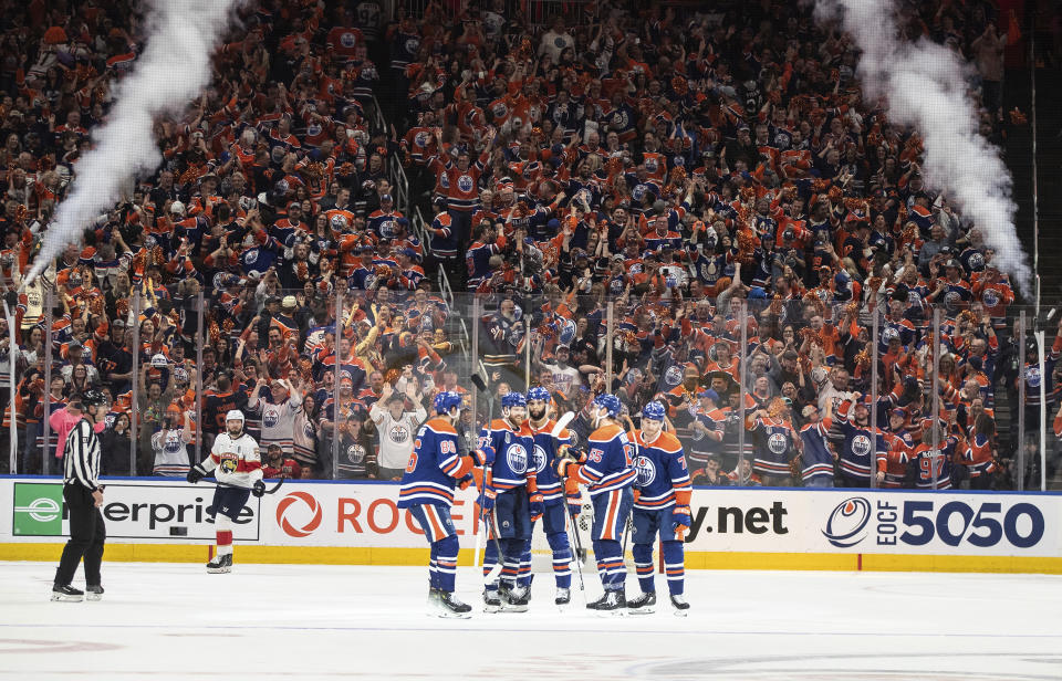 Edmonton Oilers players celebrate a goal against the Florida Panthers during the third period of Game 4 of the NHL hockey Stanley Cup Final, Saturday, June 15, 2024, in Edmonton, Alberta. (Jason Franson/The Canadian Press via AP)