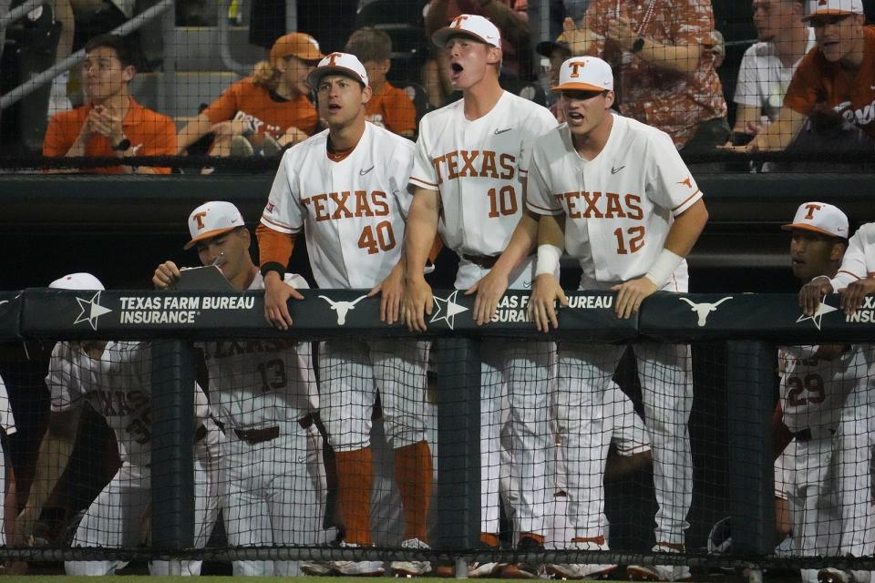 Texas catcher Preston Hoffart, catcher Kimble Schuessler and outfielder Max Belyeu cheer on their teammates during their game against LSU on Feb. 28. After a rough start to the season, the Longhorns have won 11 straight games heading into the start of Big 12 play.