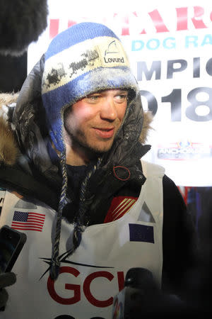 Joar Leifseth Ulsom of Norway celebrates winning the Iditarod Trail Sled Dog Race, the annual 1,000-mile (1609-km) trek across Alaska's wilderness, in Nome, Alaska, U.S., March 14, 2018. REUTERS/Nils Hahn/The Nome Nugget