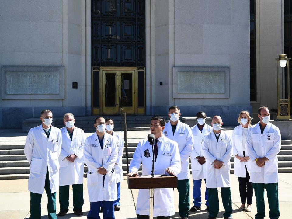 Then-White House physician Sean Conley, with medical staff, gives an update on the condition of then-President Donald Trump, on October 3, 2020, at Walter Reed Medical Center in Bethesda, Maryland.