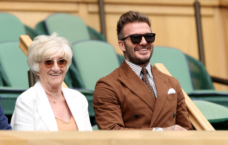 LONDON, ENGLAND - JULY 06: Sandra Beckham and David Beckham watch on from the royal box prior to the match between Rafael Nadal of Spain and Taylor Fritz of The United States during their Men's Singles Quarter Final match on day ten of The Championships Wimbledon 2022 at All England Lawn Tennis and Croquet Club on July 06, 2022 in London, England. (Photo by Clive Brunskill/Getty Images)