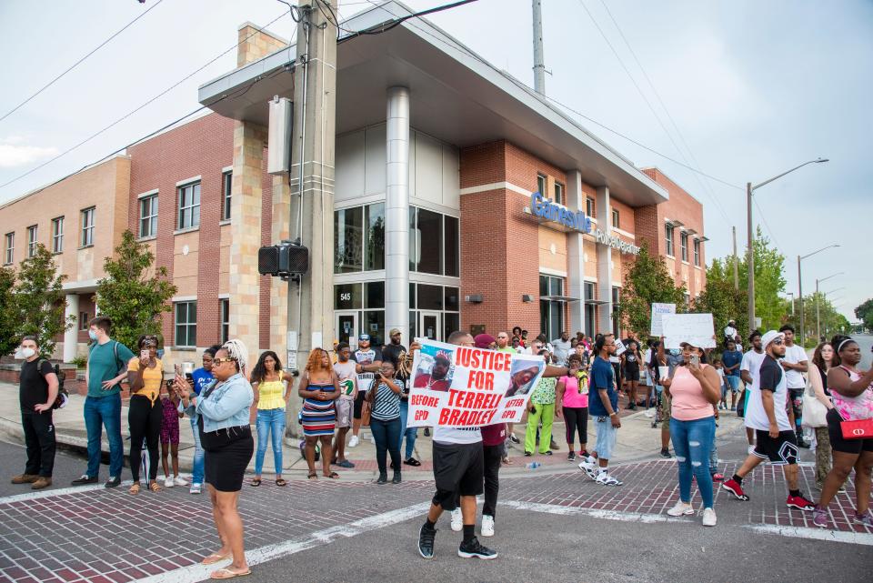 Protestors gather in front of the Gainesville Police Department building during a protest for Terrell Bradley in Gainesville, Fla., on Sunday, July 17, 2022.