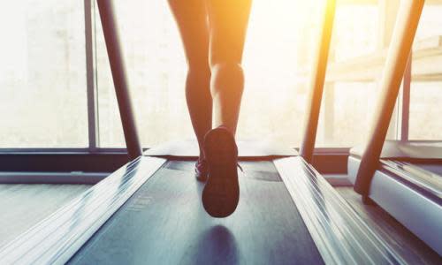 woman running on a treadmill