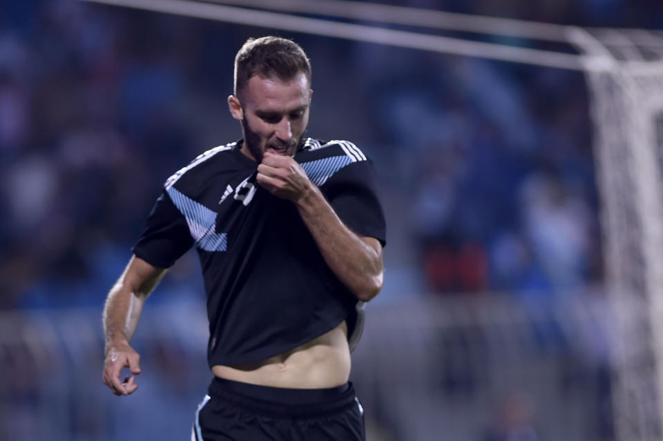 Argentina's German Pezzella celebrates scoring his side's third goal during a friendly soccer match between Argentina and Iraq at Prince Faisal bin Fahd stadium in Riyadh, Saudi Arabia, Thursday, Oct. 11, 2018. (AP Photo)