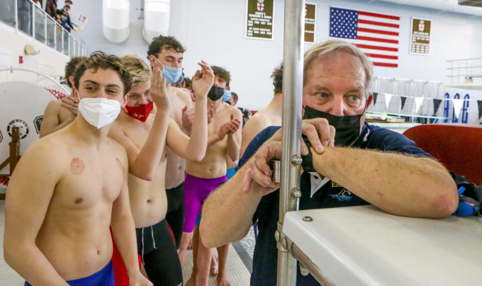 Barrington head coach Sandy Gorham and his team await a result in Saturday's state championship meet. The Eagles defeated the Hendricken Hawks, 402-365, for their first state championship since 1989.