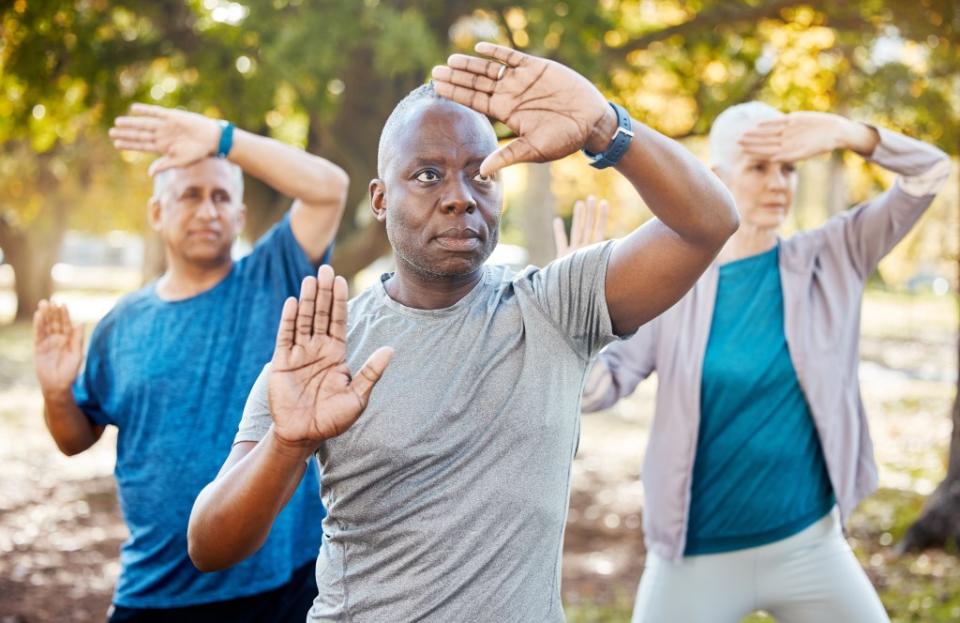 Those who did tai chi were also more likely to avoid progressing to hypertension. Wesley JvR/peopleimages.com – stock.adobe.com