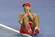 Germany's Angelique Kerber celebrates after winning her final match against Serena Williams of the U.S. at the Australian Open tennis tournament at Melbourne Park, Australia, January 30, 2016. REUTERS/Issei Kato