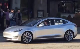 Tesla Model 3 Driving on a Public Road